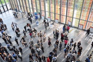 Attendees networking at SwissTech Convention Centre